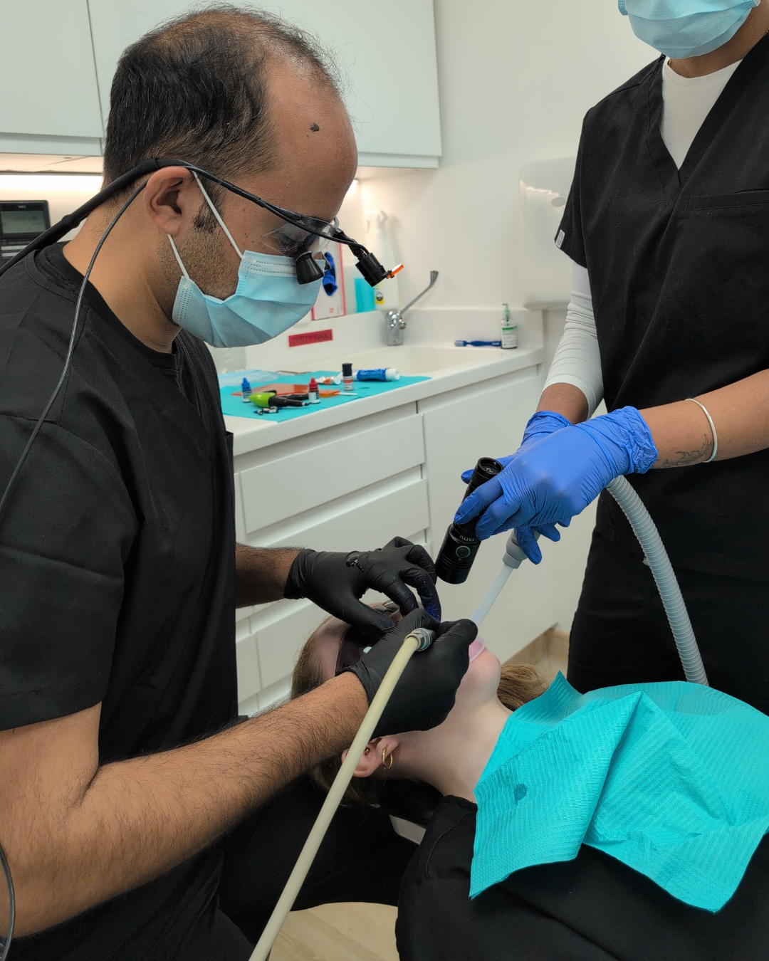 Dr Jasdip Sagoo with a patient at J&R Dental Ruislip.