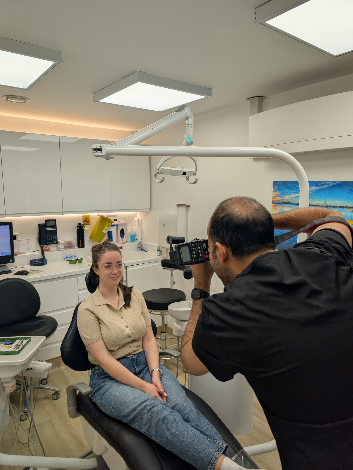Dr Jasdip Sagoo with a patient at J&R Dental Ruislip.